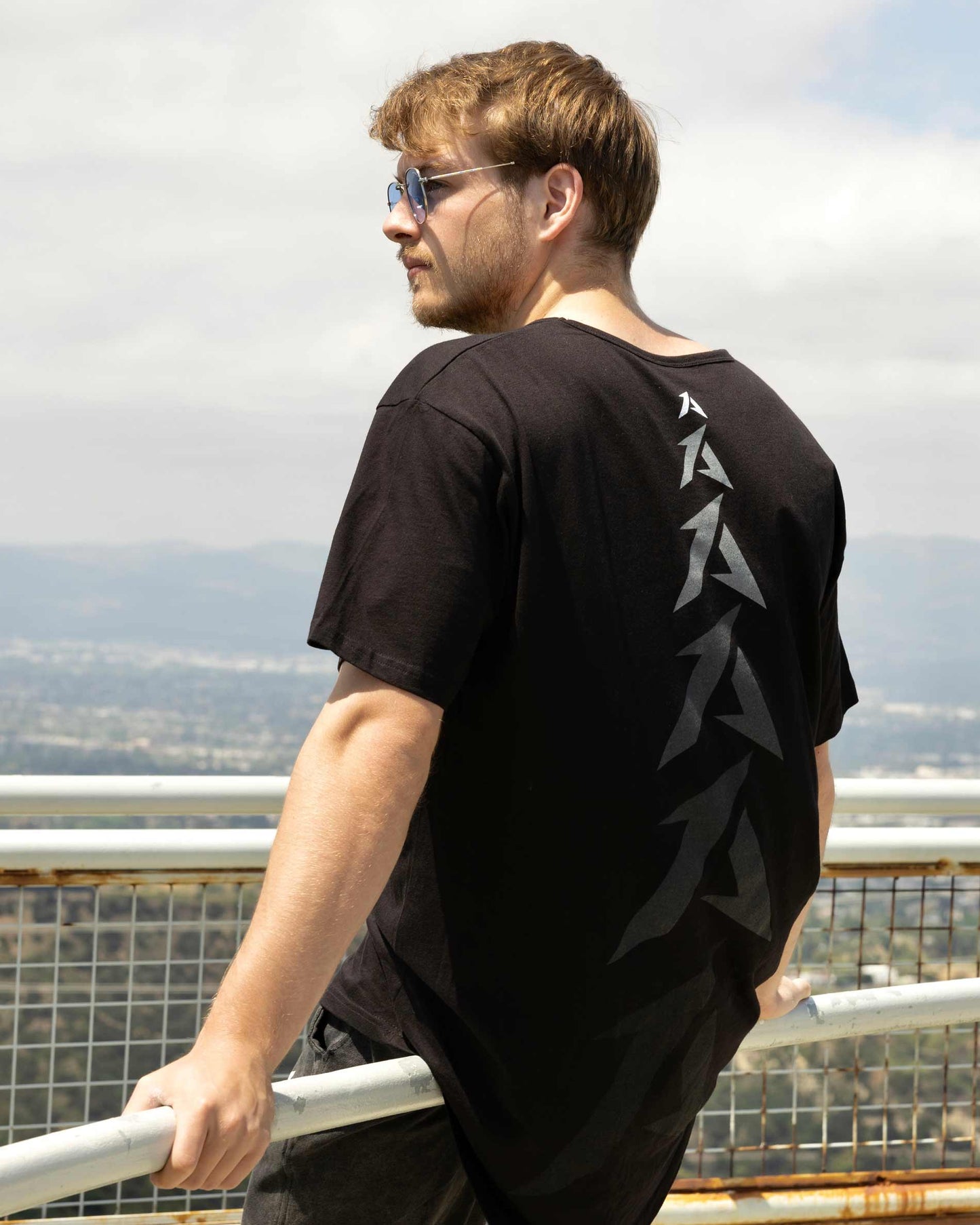 Purchase Fading Spine Drop Tail Tee in United States